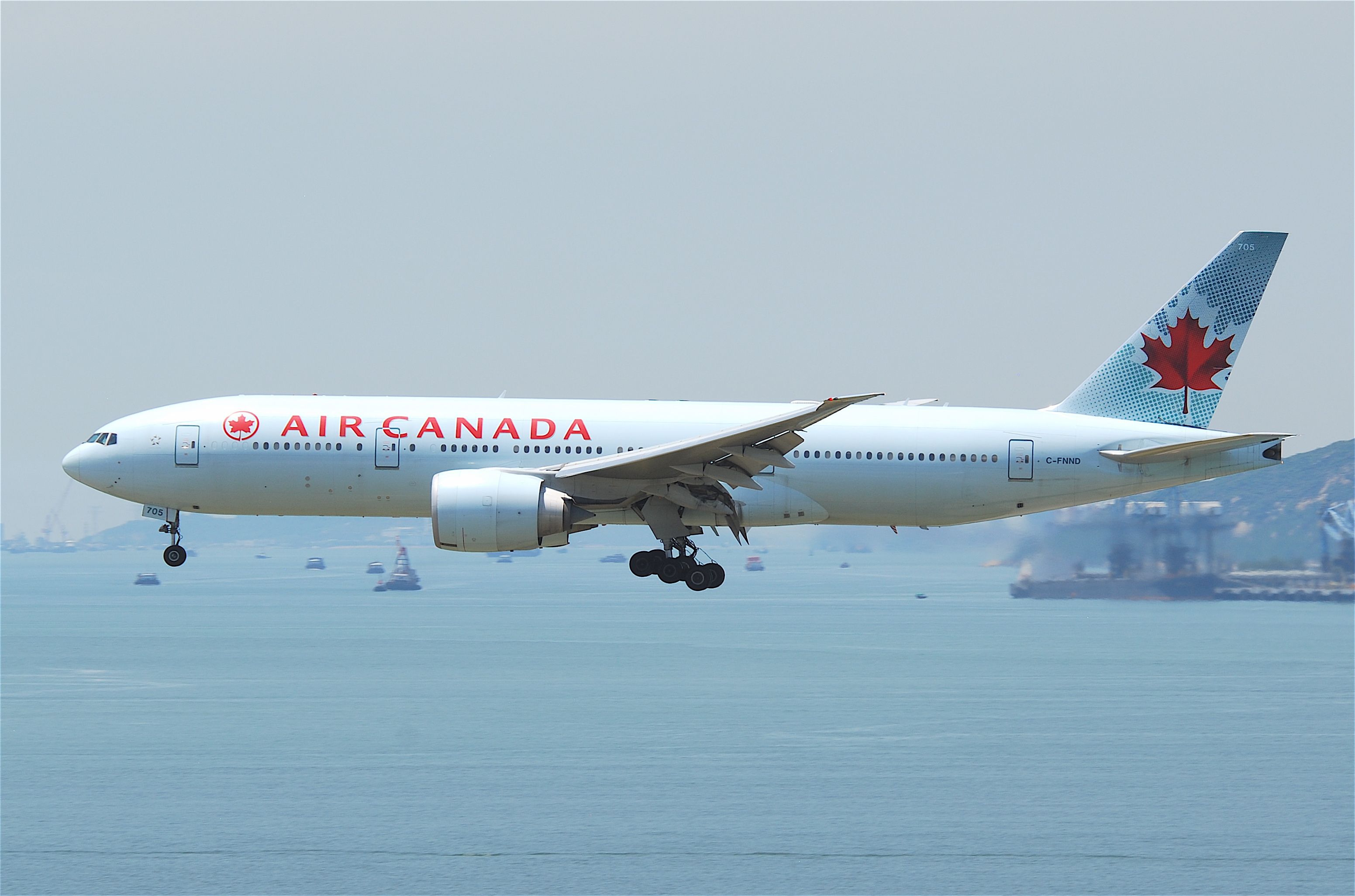 Air Canada Boeing 777-200LR; C-FNND@HKG;04.08.2011 615op (6207935726)