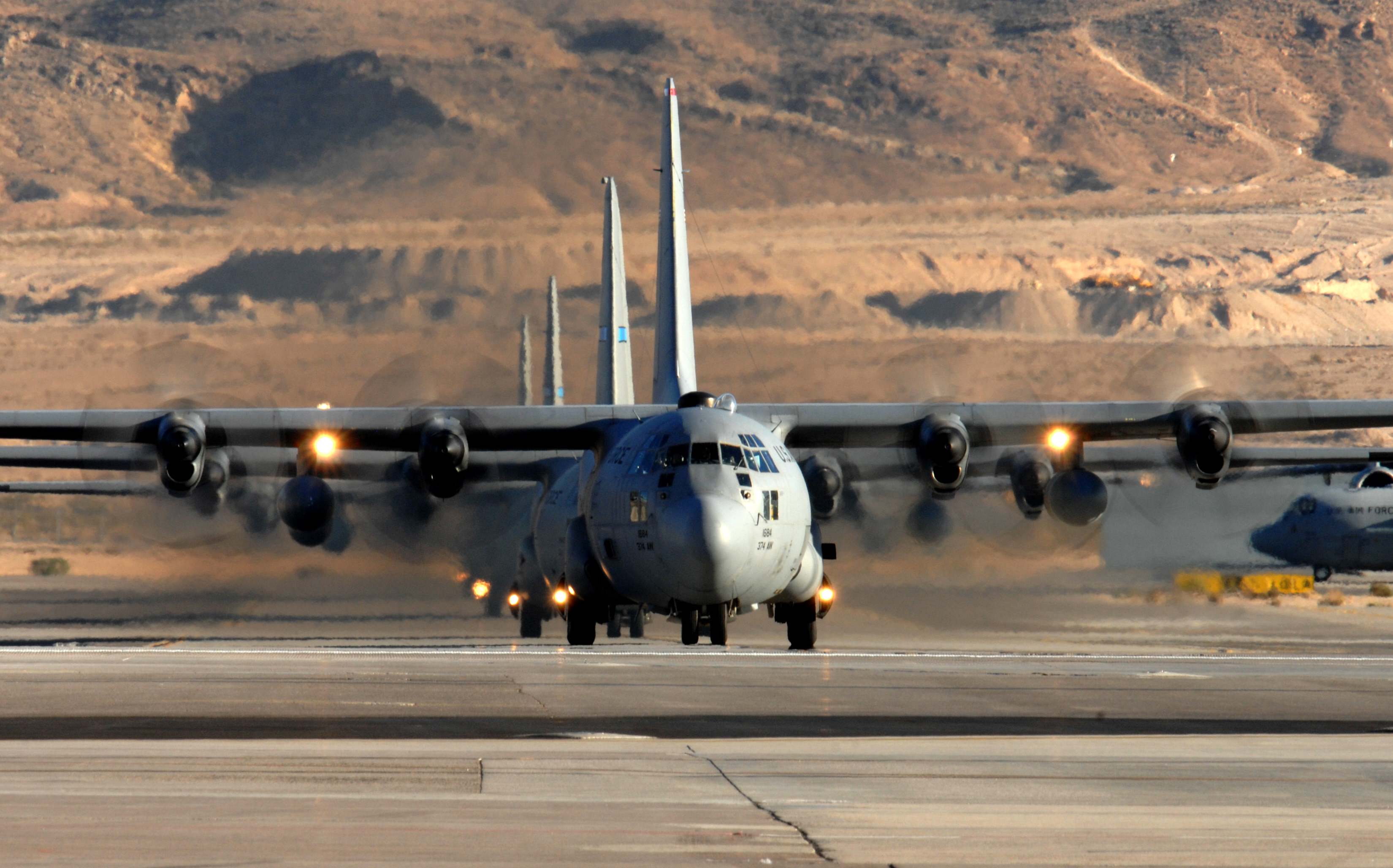 C-130s taxi in formation - 081119-F-0782R-291