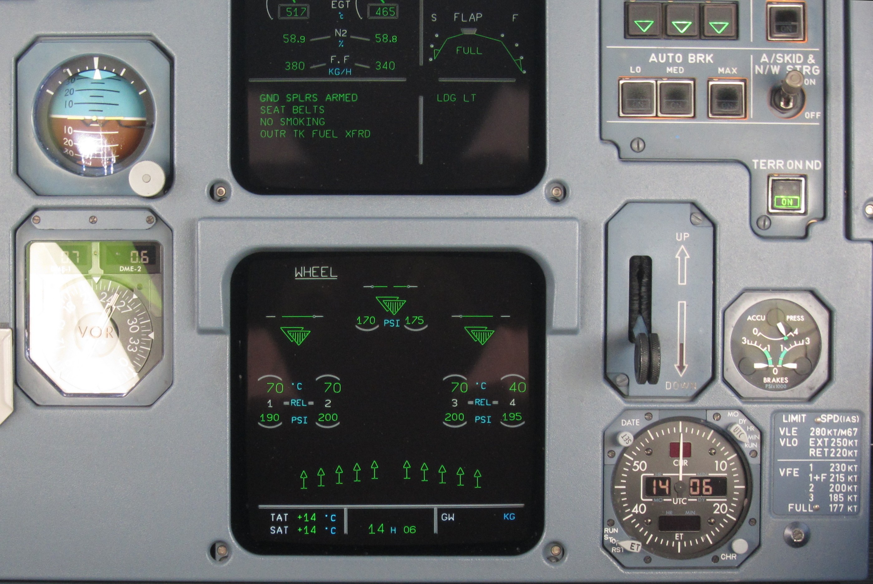 Center panel display indicating spoilers deployment in A320 cockpit