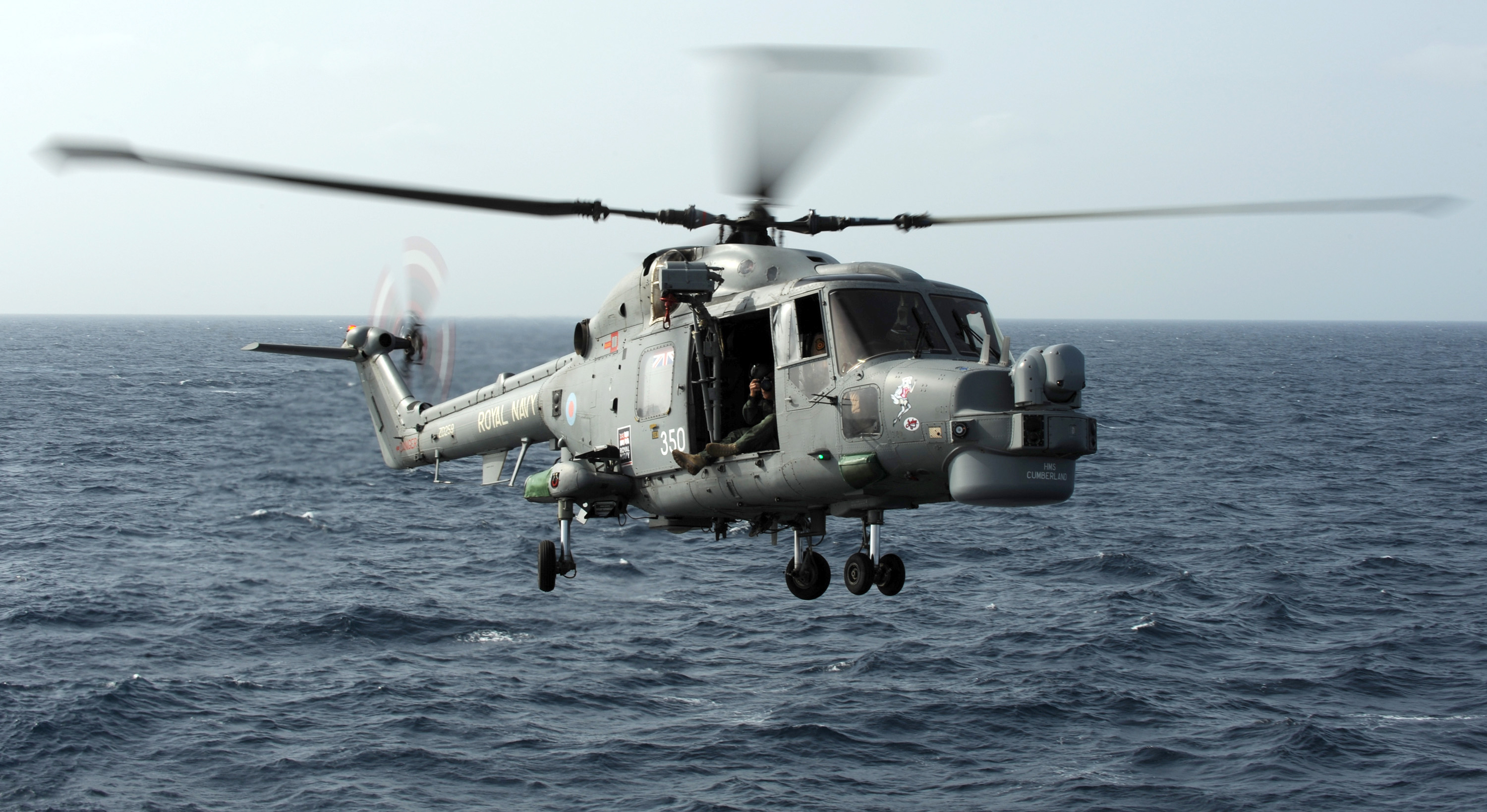 Helicopter Capturing Images Of A Lynx Landing On HMS Cornwall MOD 45150757