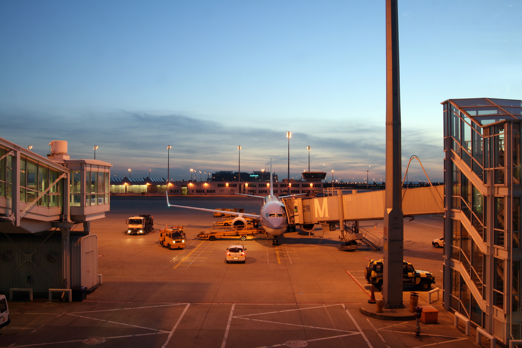 Munich Airport plane handling at sunset