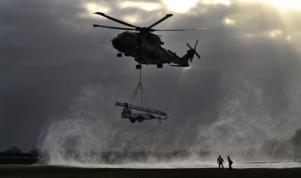 A Royal Air Force Merlin Helicopter Creates a Downwash During Lifting Trials MOD 45153602