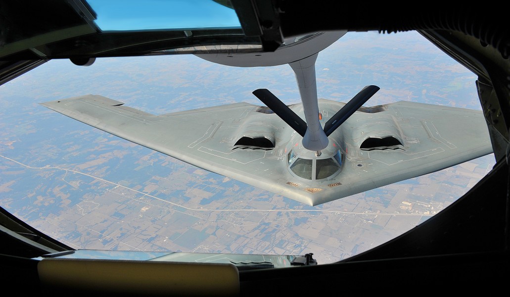 A U.S. Air Force B-2 Spirit bomber refuels from a KC-135 Stratotanker during flight operations 120829-F-TS228-024