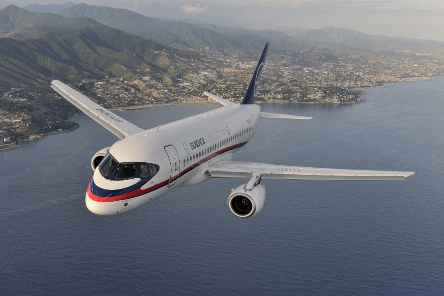 Air-to-air photo of a Sukhoi Superjet 100 (RA-97004) over Italy