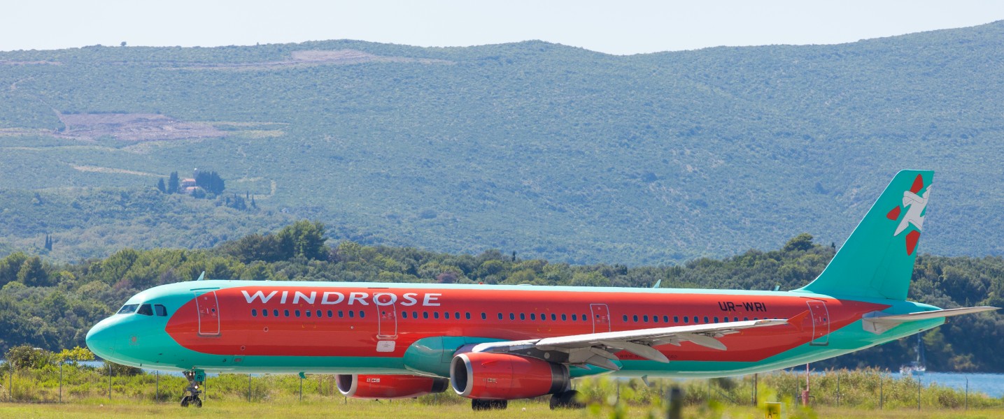 a Windrose airplane photographed in Tivat, Montenegro in August 2014, picture 6