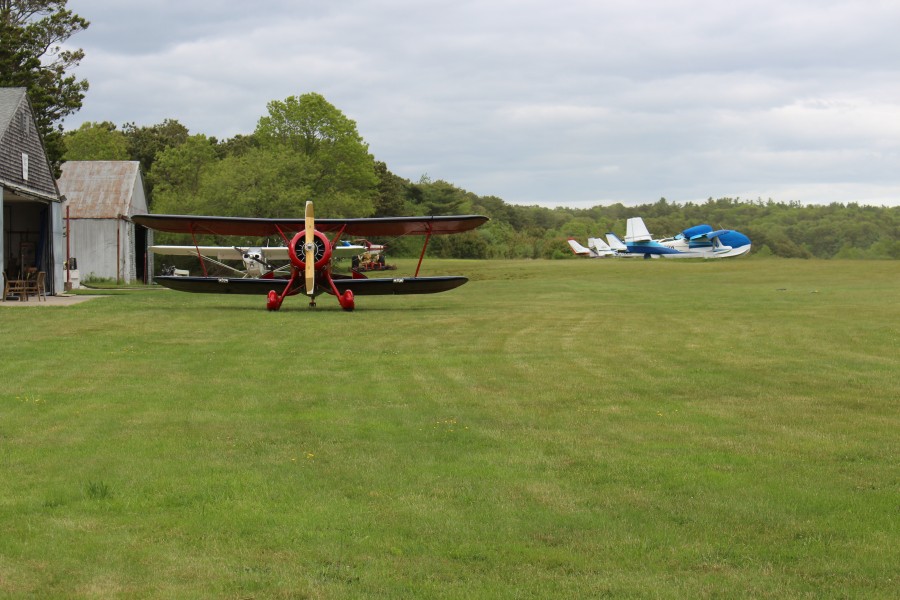 Biplane and parking area at Cape Cod Airport