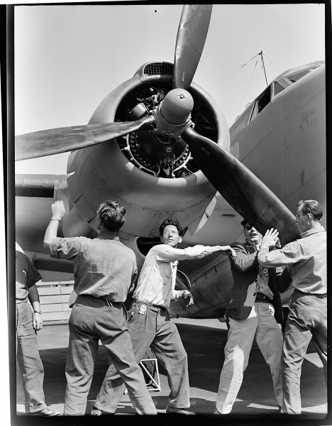 Checking finished PV-1 at the Vega aircraft plant, Burbank, Calif. Workmen spin propeller. - NARA - 520736