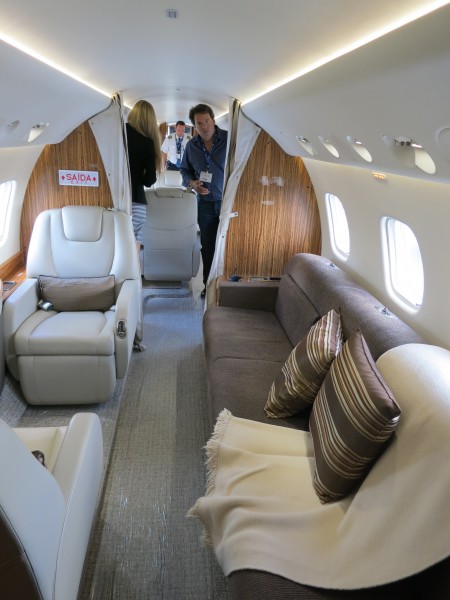 Embraer Legacy 650 interior of aft cabin with passengers