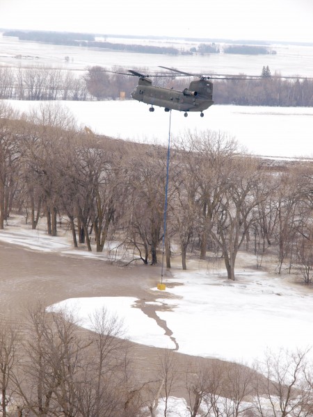 FEMA - 40392 - NG Helicopter ice breaking operation in Minnesota