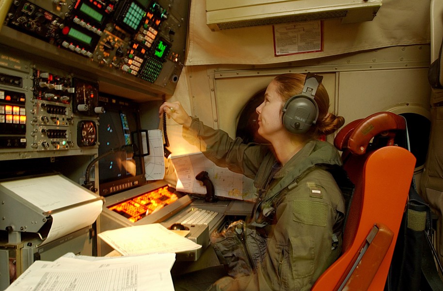 US Navy 030509-N-6501M-018 Lt. j.g. Karensa L. Heidmiller operates the navigation station aboard a P-3C Orion aircraft during a mission to the Republic of the Philippines