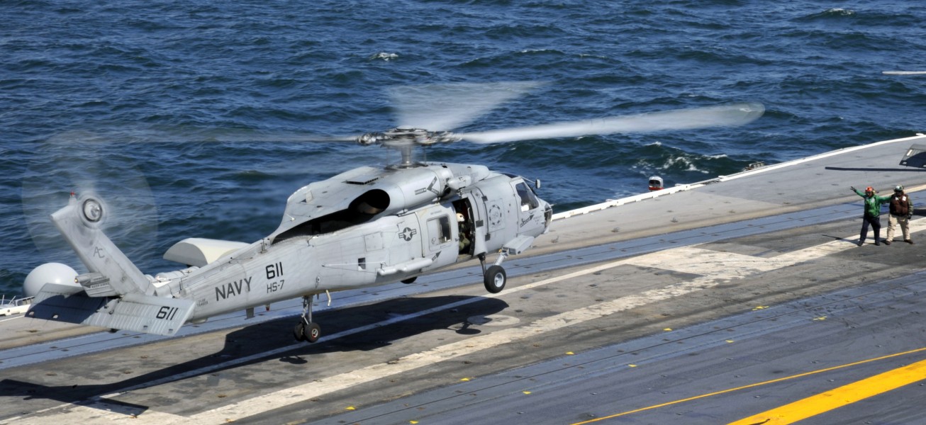 US Navy 100323-N-6003P-067 An SH-60F Sea Hawk helicopter assigned to the Dusty Dogs of Helicopter Anti-submarine Squadron (HS) 7 lands aboard the Nimitz-class aircraft carrier USS Harry S. Truman (CVN 75)
