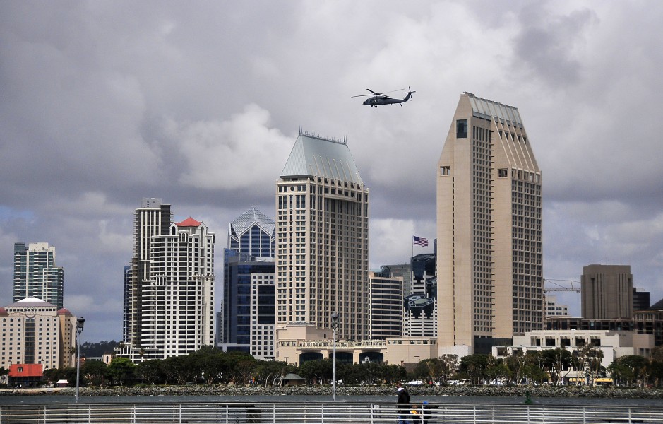 US Navy 100421-N-4774B-013 An SH-60F Sea Hawk helicopter flies over downtown San Diego during flight operations. San Diego is home to one of the world's largest concentration of naval forces and ships