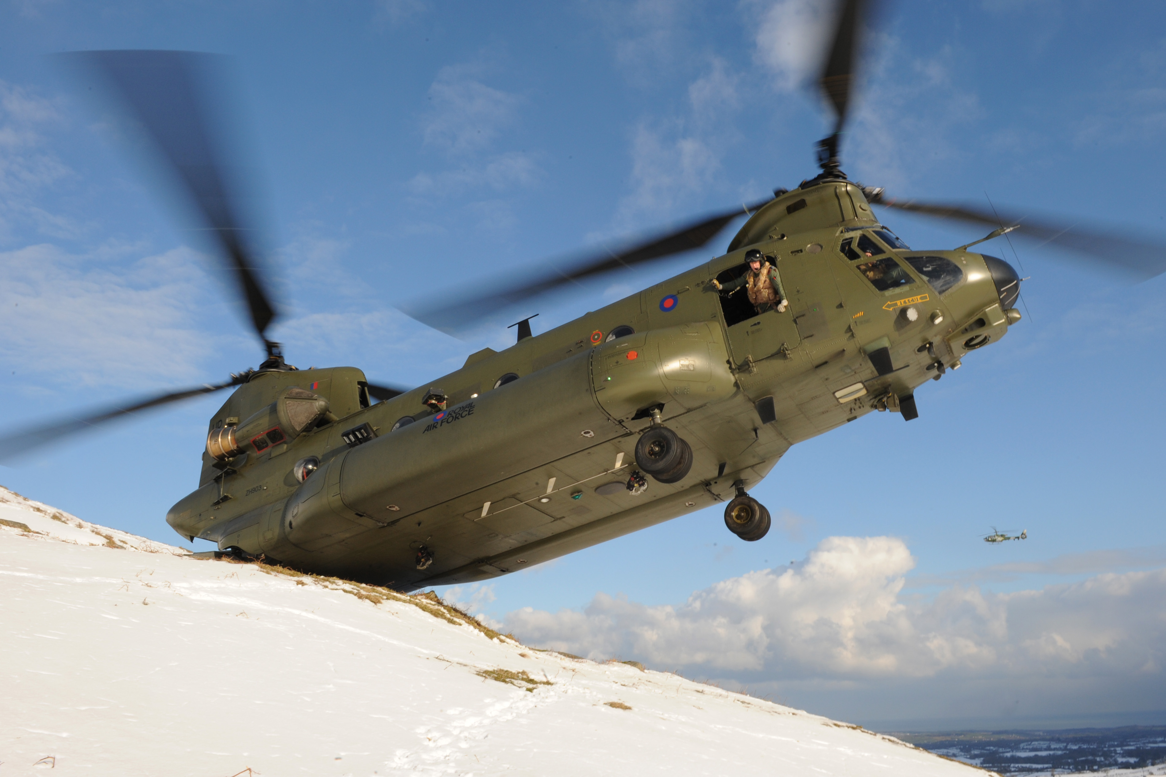 RAF Chinook Delivering Agricultural Food Aid After Heavy Snow MOD 45155332