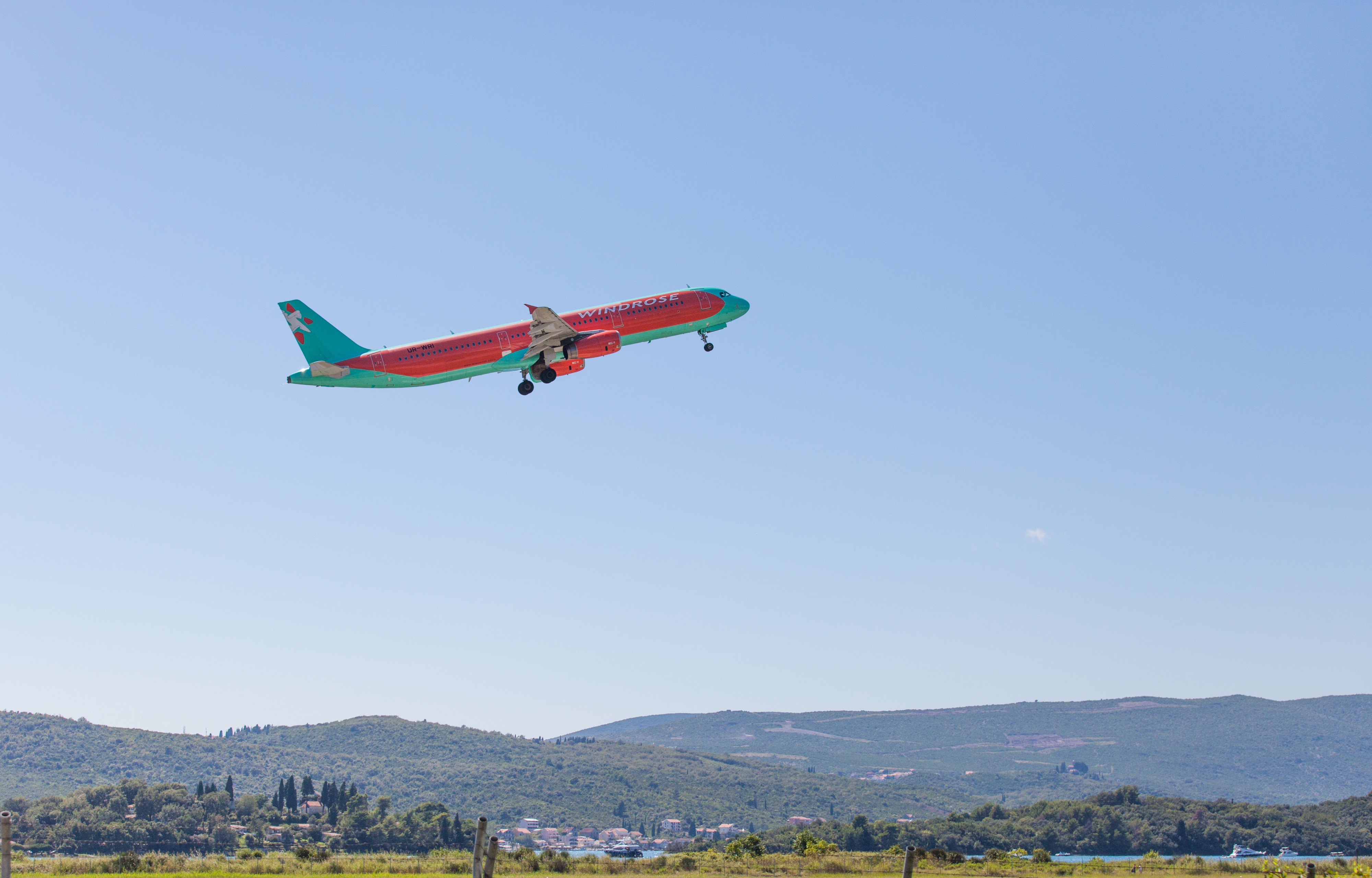 a WIndrose airplane departing Tivat, Montenegro in August 2014, picture 7