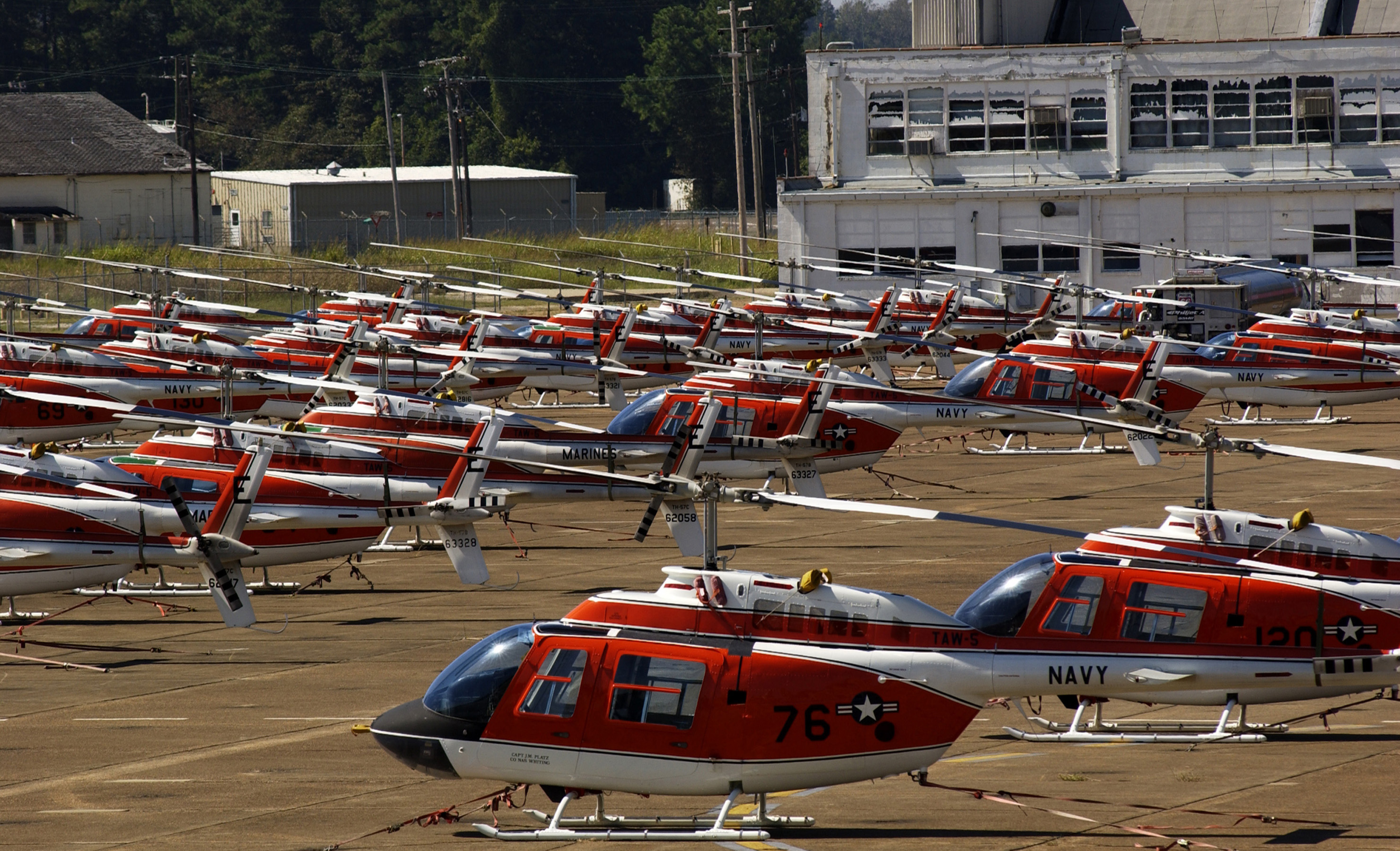 US Navy 040915-N-3659B-002 TH-57 Sea Ranger Helicopters sit on the flight line at Millington Municipal Airport