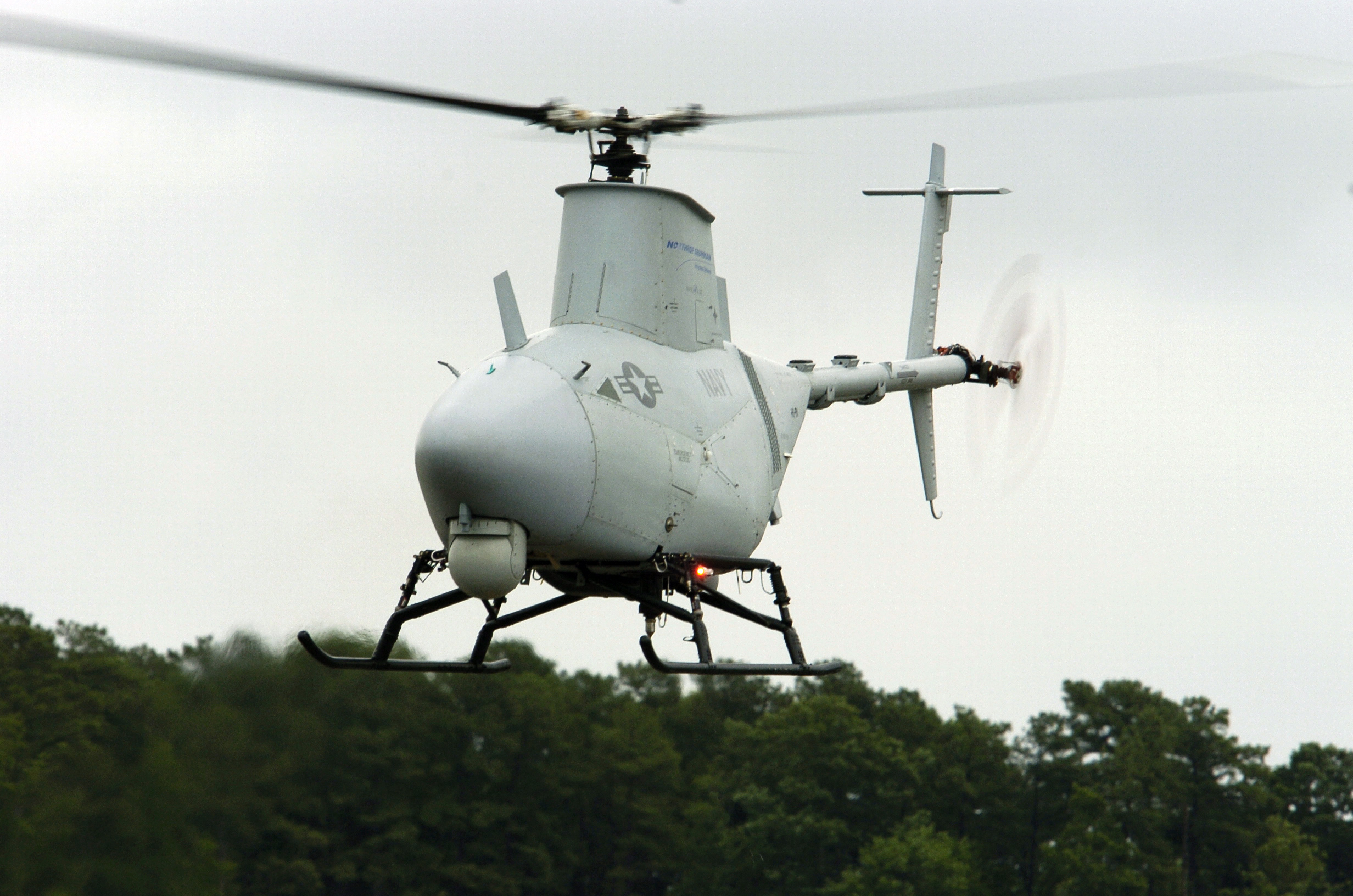 US Navy 050627-N-0295M-154 A RQ-8A Fire Scout Vertical Takeoff and Landing Tactical Unmanned Aerial Vehicle (VTUAV) System takes off for a flight demonstration at the 2005 Naval Unmanned Aerial Vehicle Air Demo