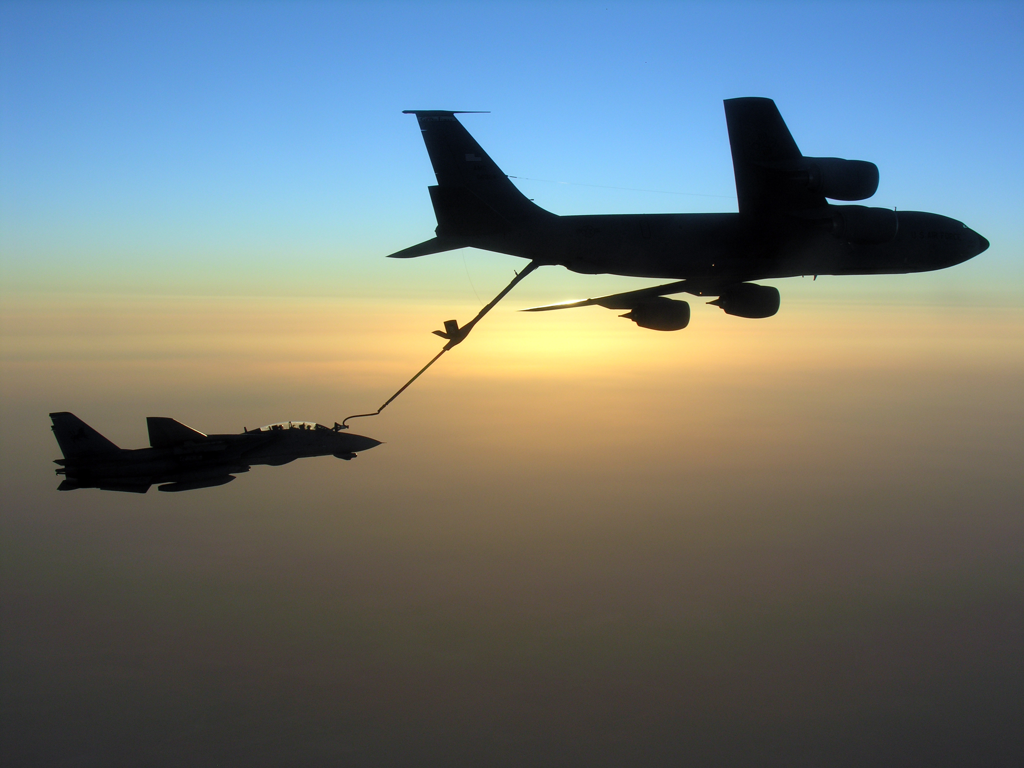 US Navy 051109-N-0000X-001 An F-14D Tomcat conducts aerial refueling with a U.S. Air Force KC-135 Stratotanker during a mission over the Persian Gulf region