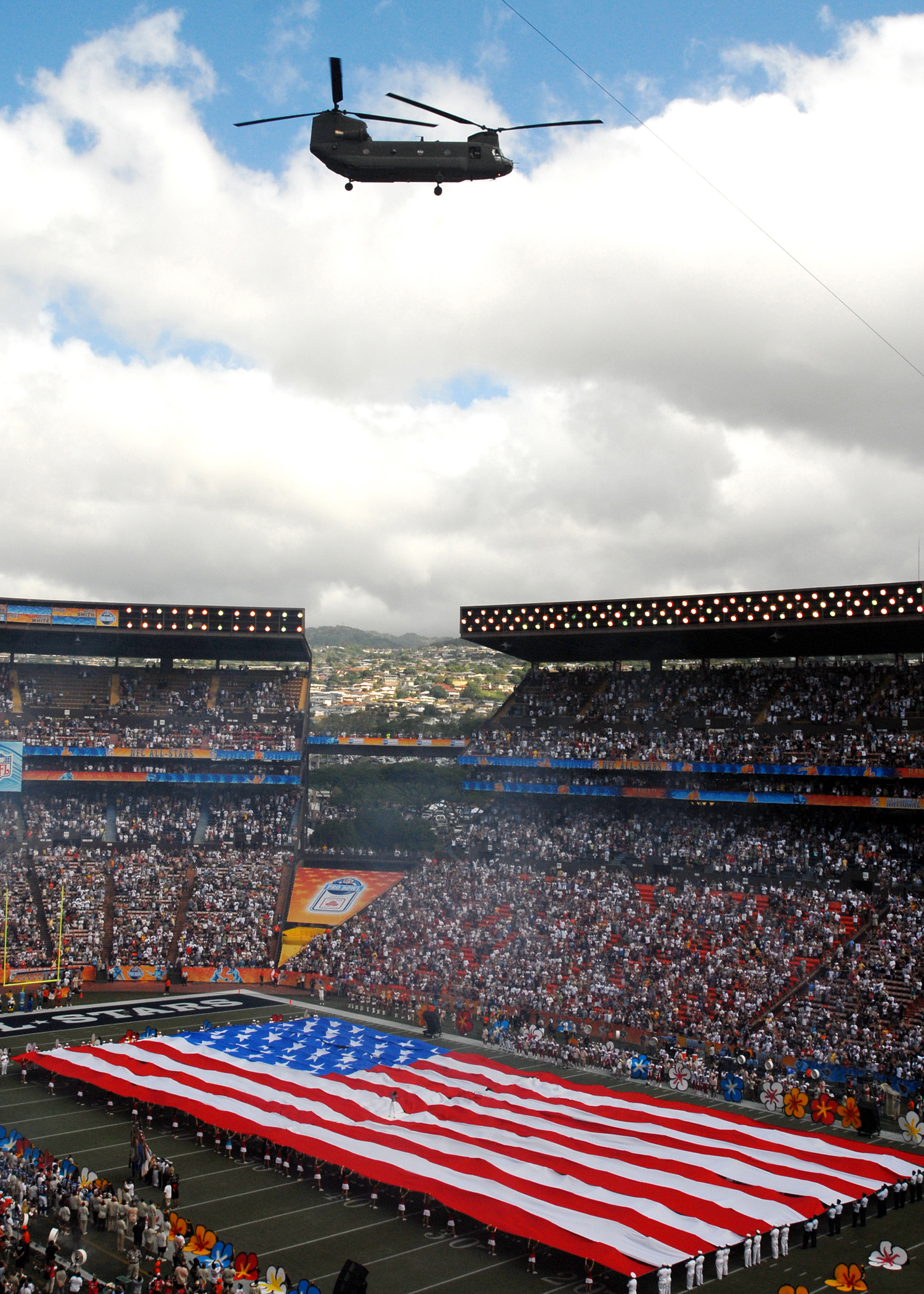 US Navy 080210-N-5476H-054 A Hawaii Army National Guard CH-47 Chinook helicopter flies above Aloha Stadium during the national anthem during pre-game ceremonies for the 2008 NFL Pro Bowl