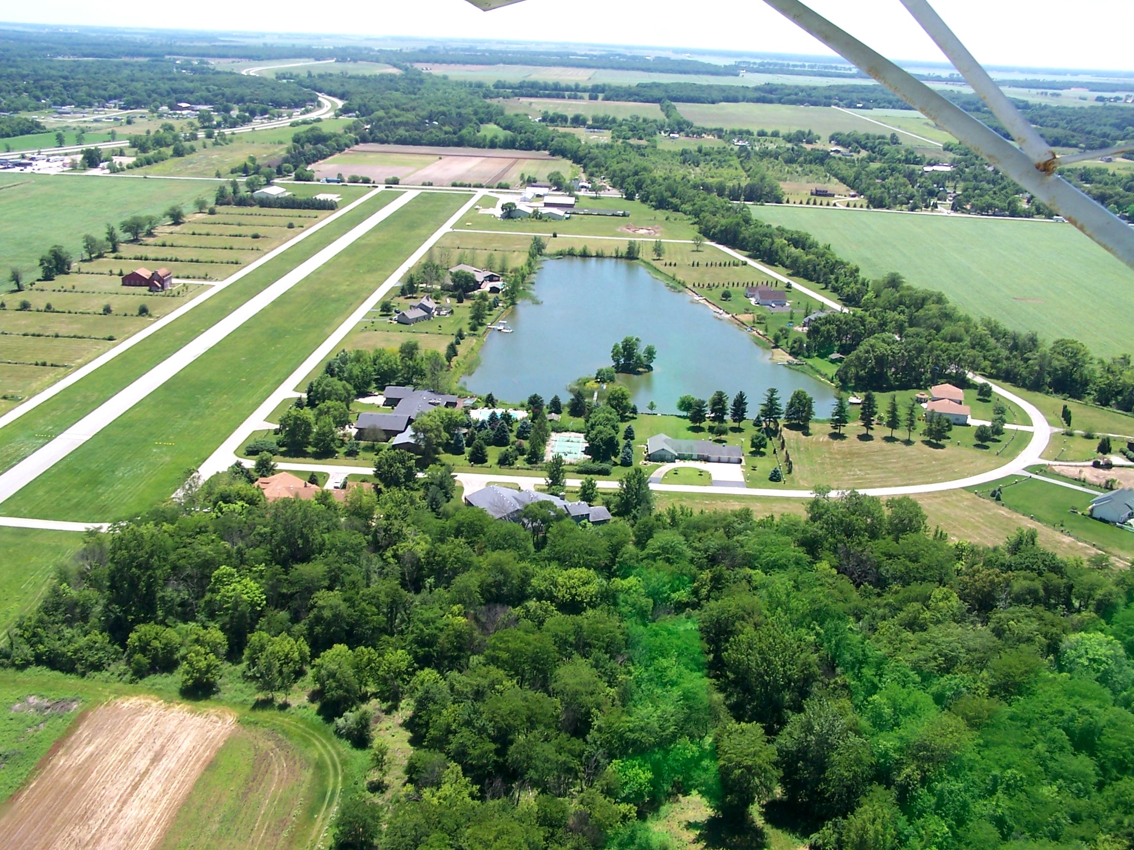 Lake Village Airport and Lake Aero Estates looking south