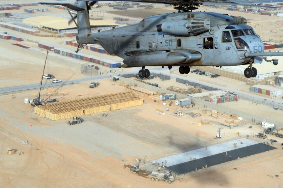 US Navy 110105-N-0318S-093 A U.S. Marine Corps CH-53 Sea Stallion helicopter flies over a Seabee project site in Camp Leatherneck, Afghanistan