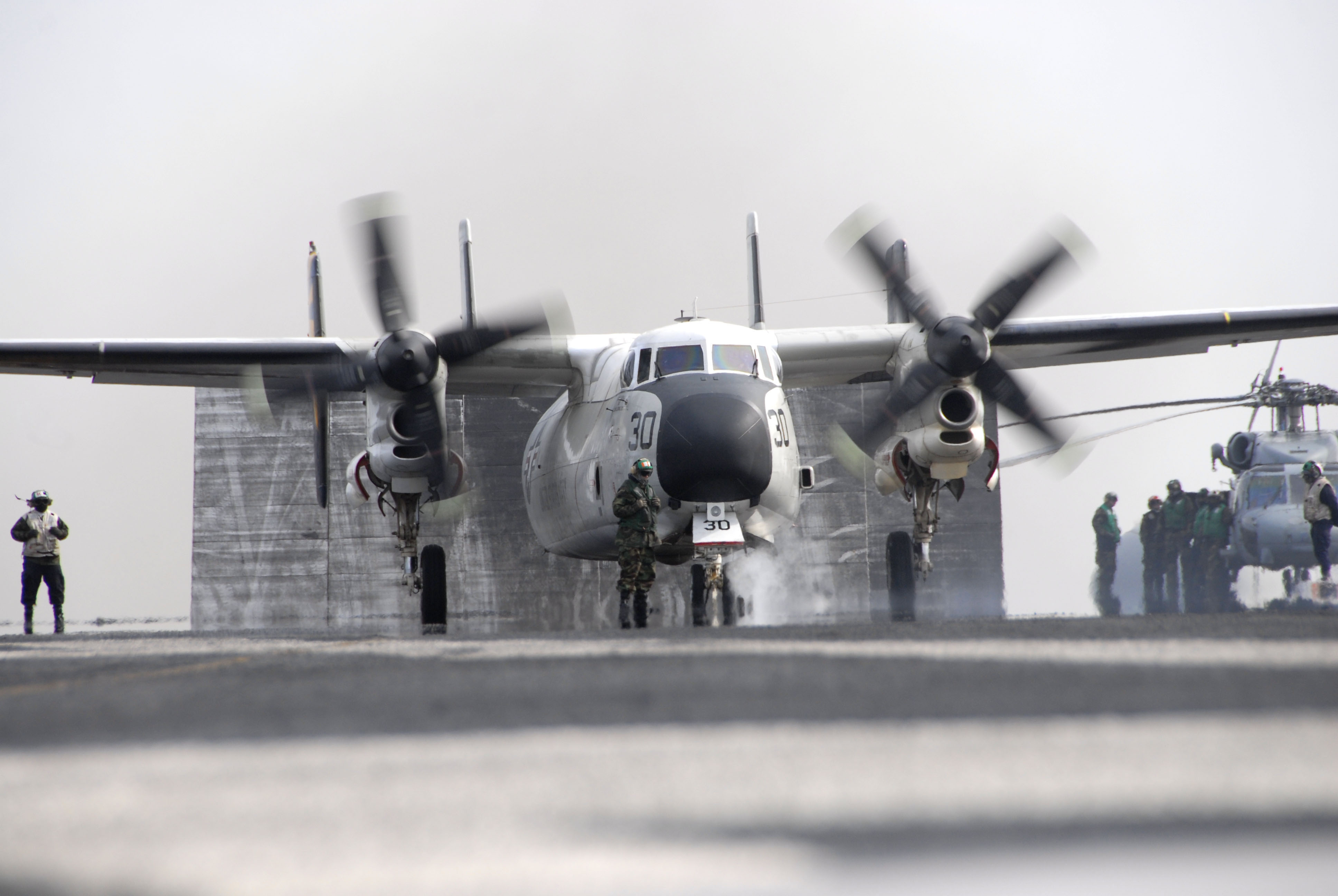 US Navy 110320-N-KF029-100 A C-2A Greyhound assigned to the Providers of Fleet Logistics Combat Support Squadron (VRC) 30 prepares to take off from
