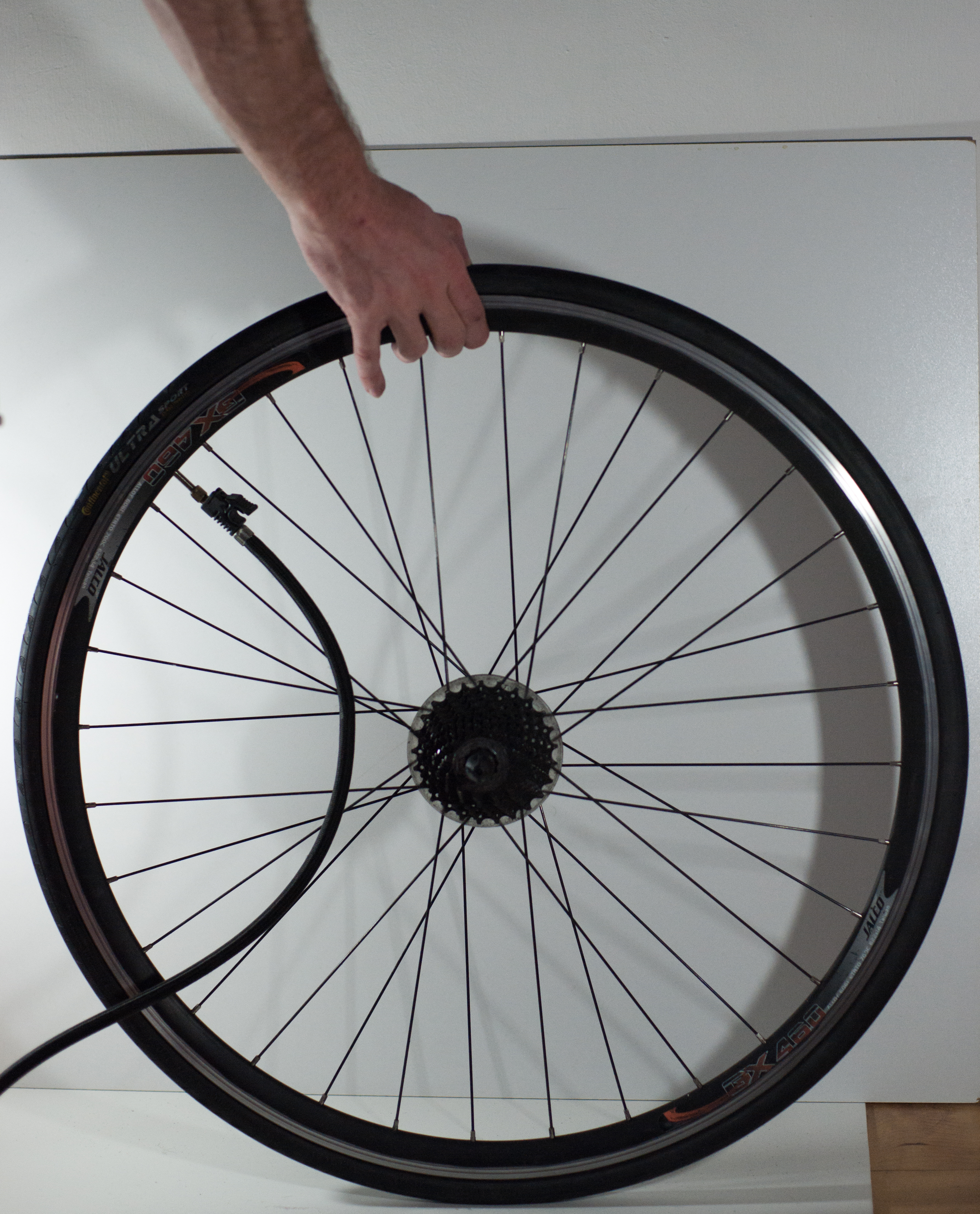 Changing an inner tube - Inflating the new tube