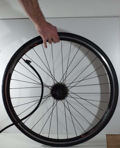 Changing an inner tube - Inflating the new tube