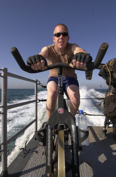 US Navy 050507-N-3289C-028 Gunners Mate 2nd Class Matthew Maple, from Pittsburgh, Pa., takes time out to stay physically fit by training on a stationary bike aboard the costal patrol ship USS Sirocco (PC 6)