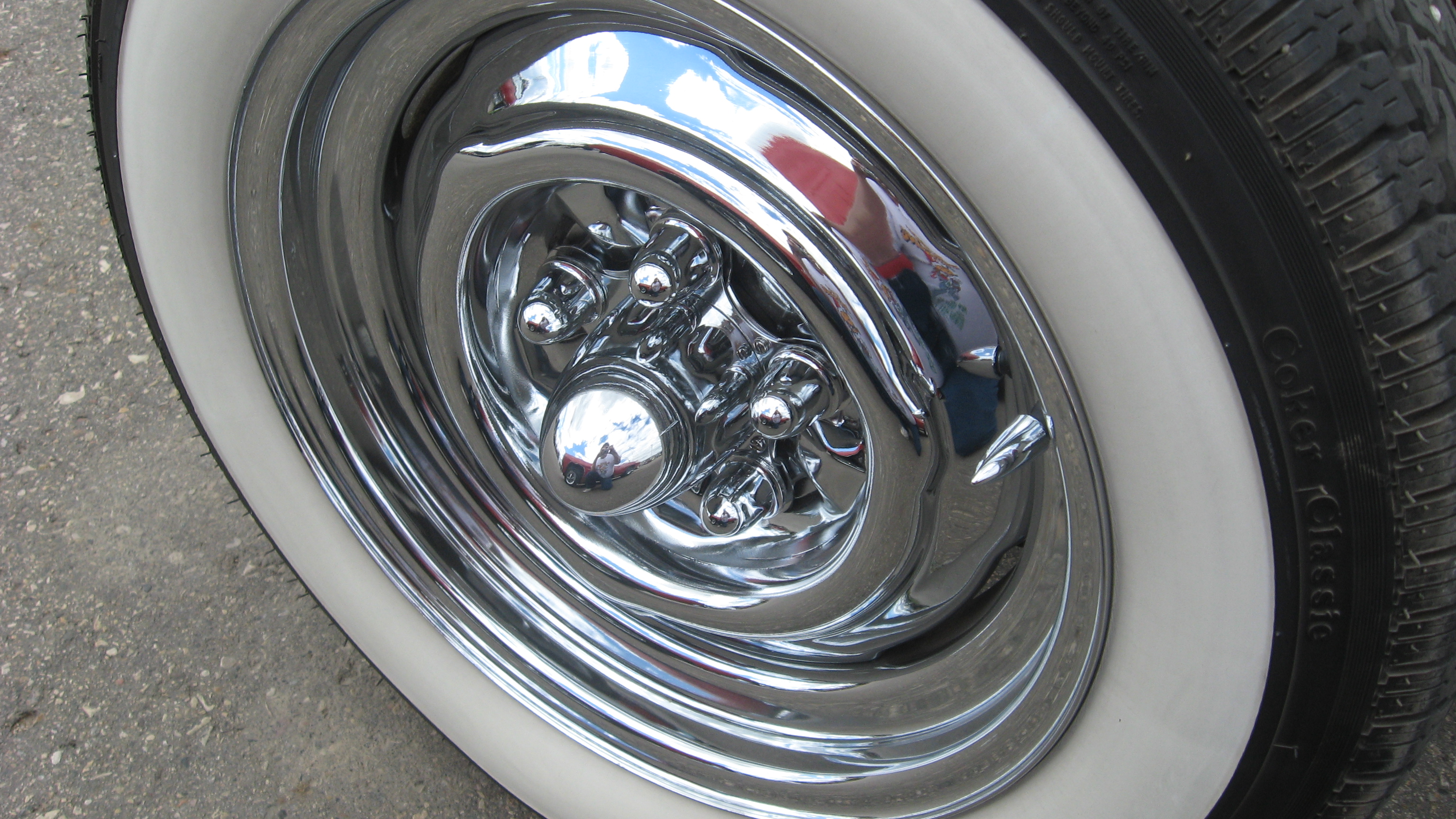 Chrome rim with bullet air cap