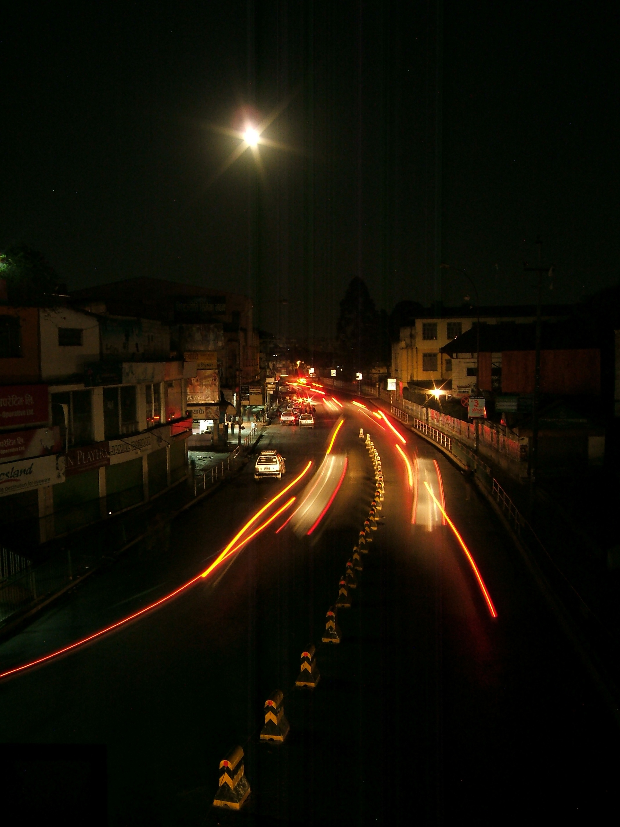 Light Trails under the moon (4077607996)