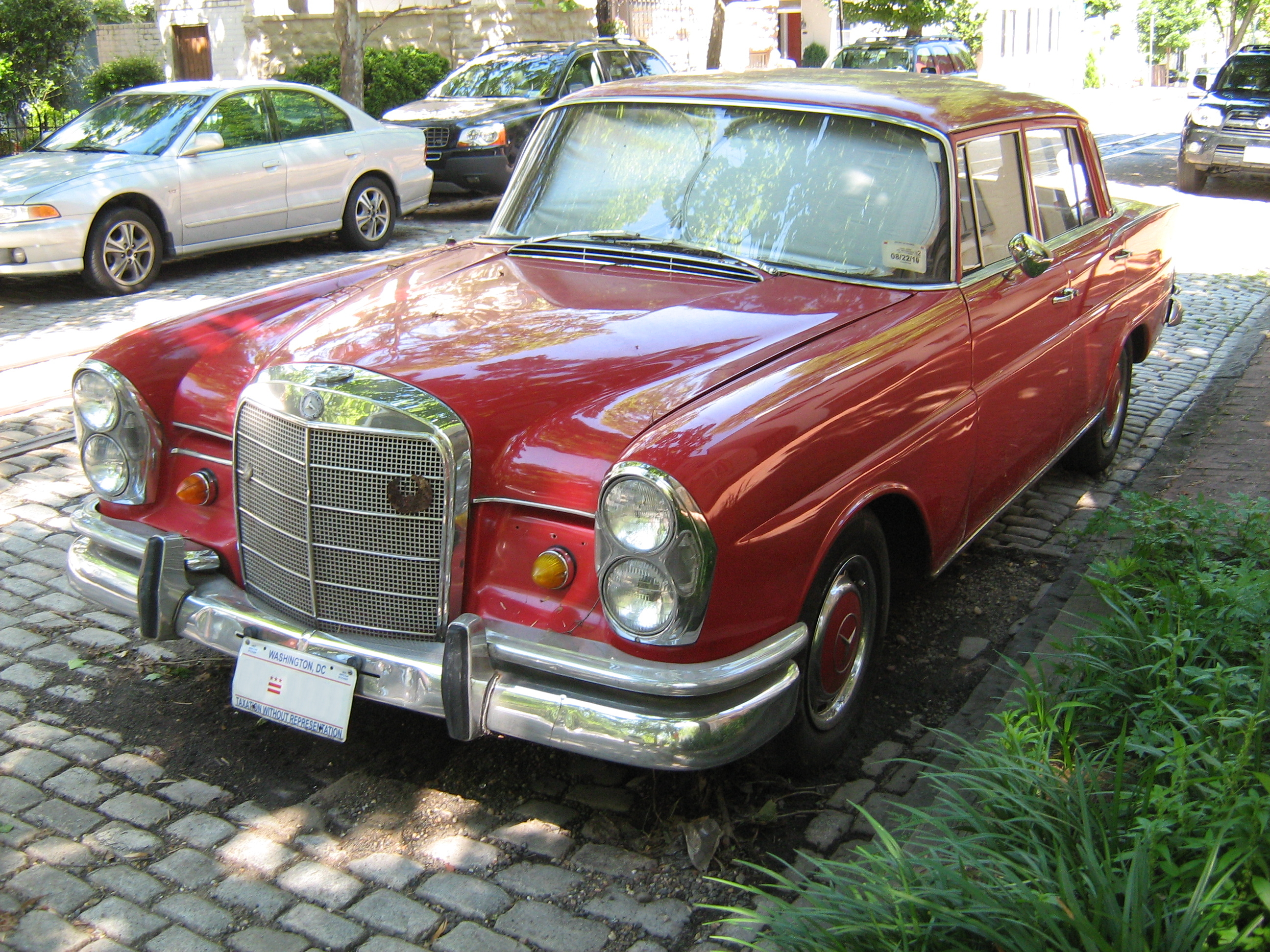 Mercedes-Benz 230S red 4-D fl