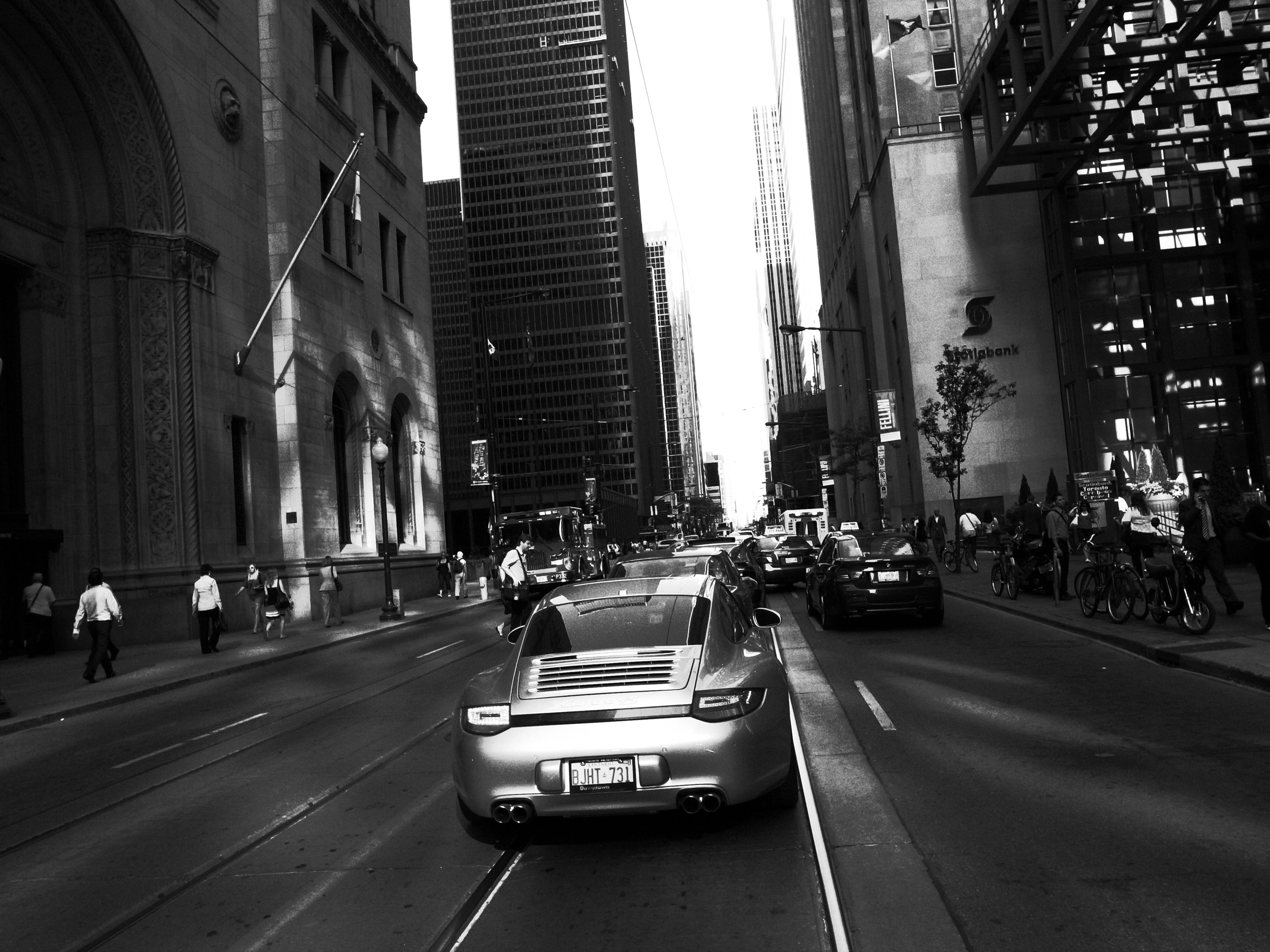 Porsche 997 Carrera 4S on Toronto's King Street West near the Scotiabank