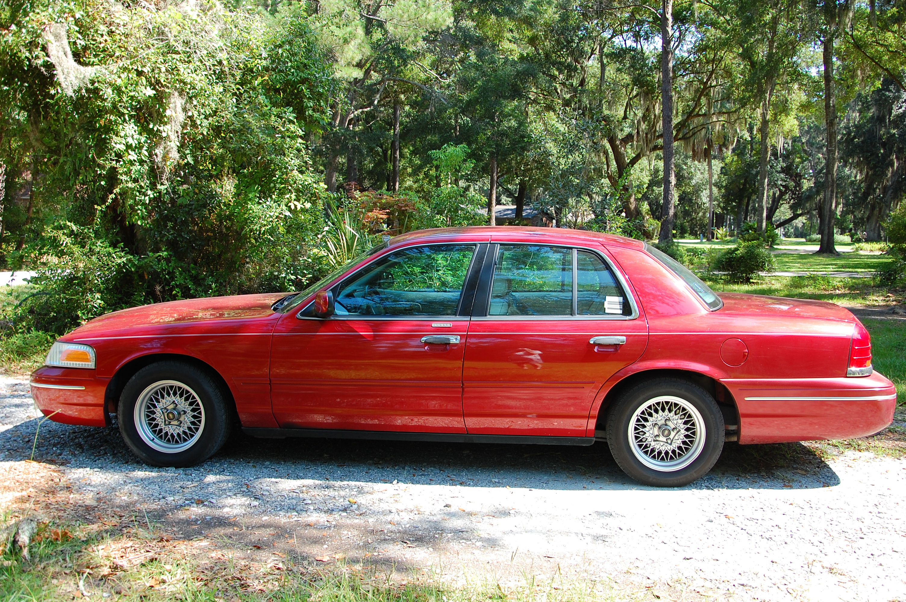 Red 1999 Ford Crown Victoria