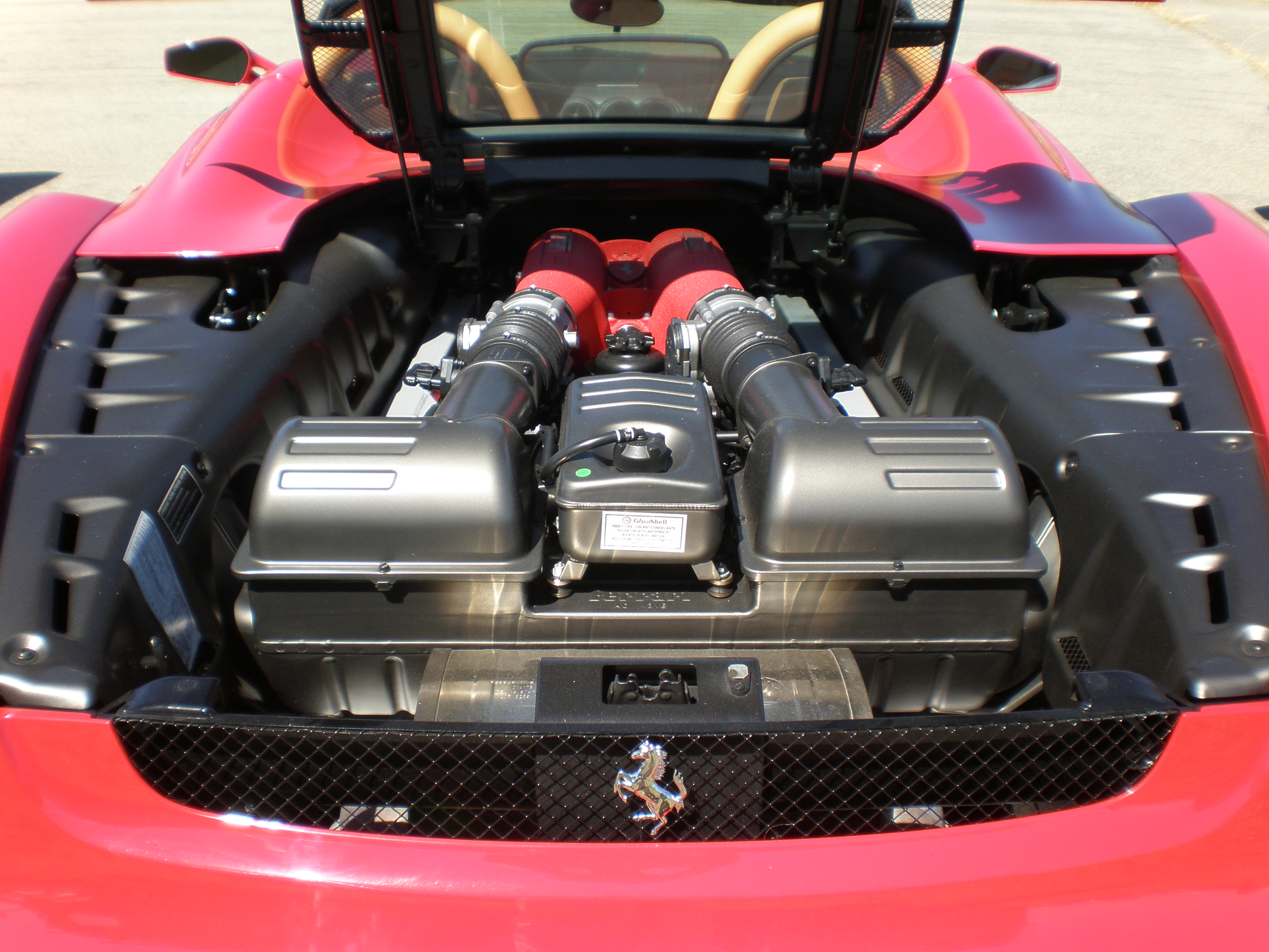 Red Ferrari F430 Spider engine hood open