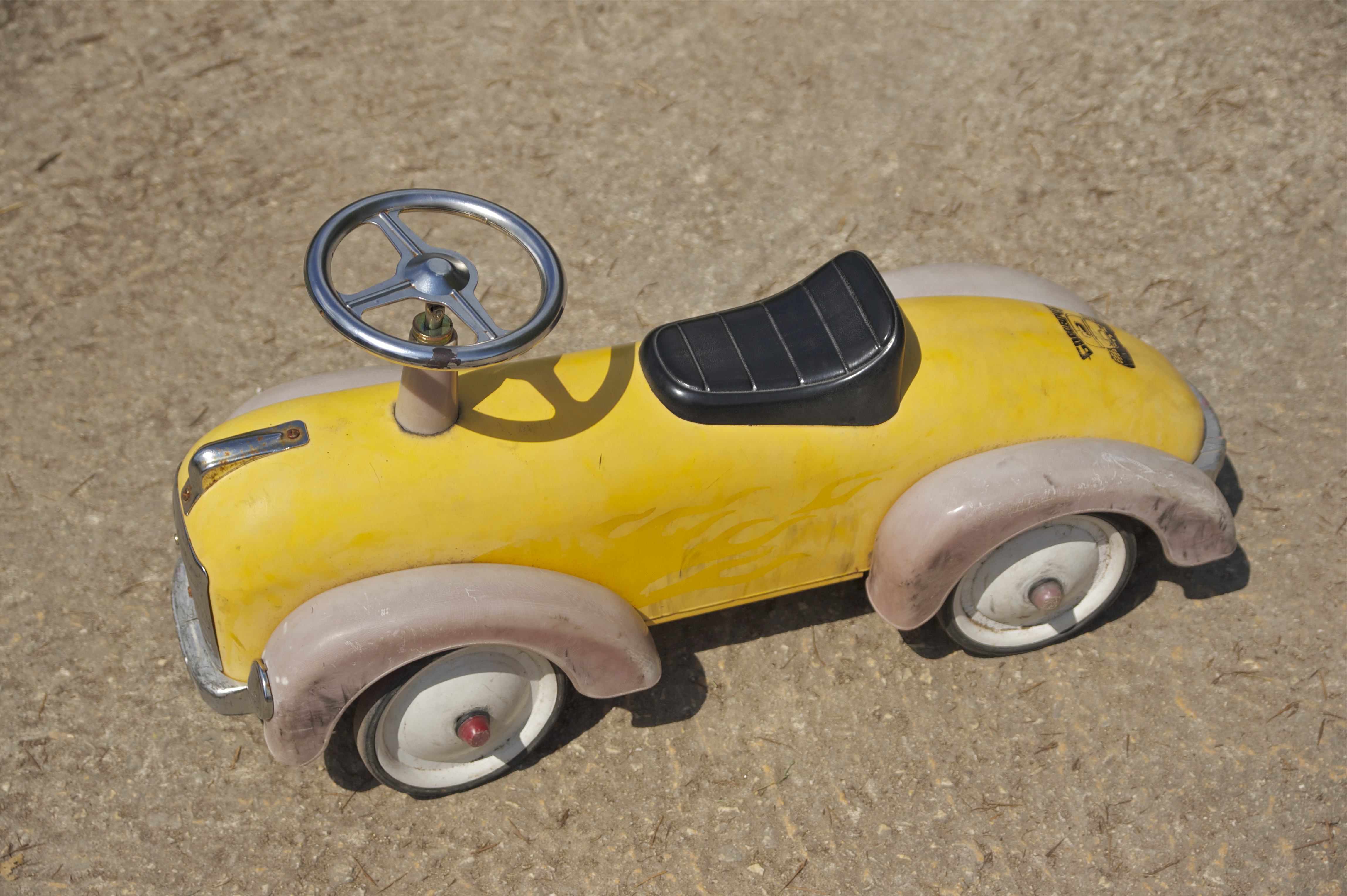 Yellow toy car