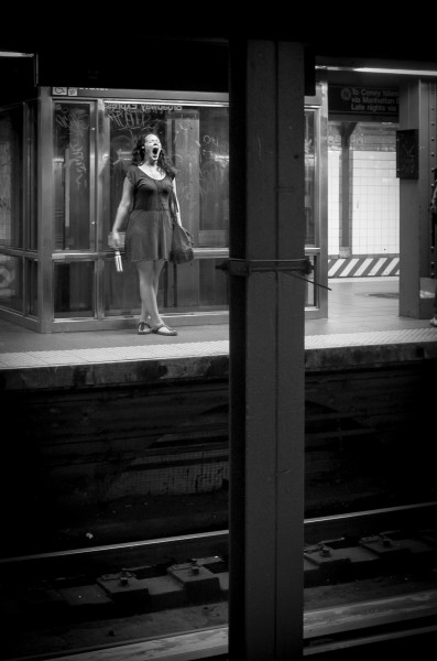 14 Street subway station woman yawning