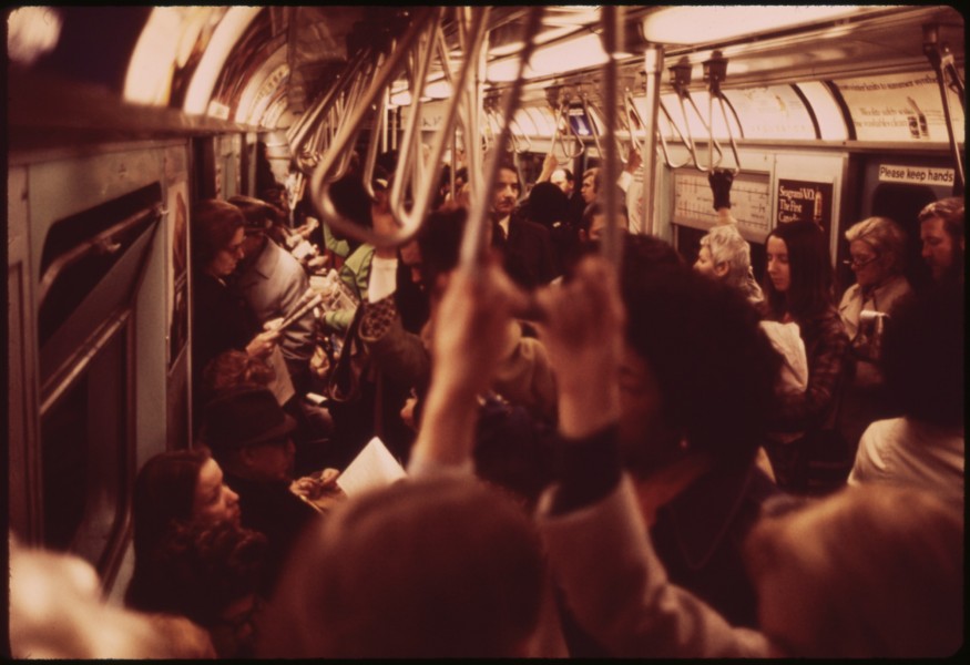 SUBWAY CAR AT RUSH HOUR. THIS IS ONE OF THE NEWER, CLEANER CARS - NARA - 554328