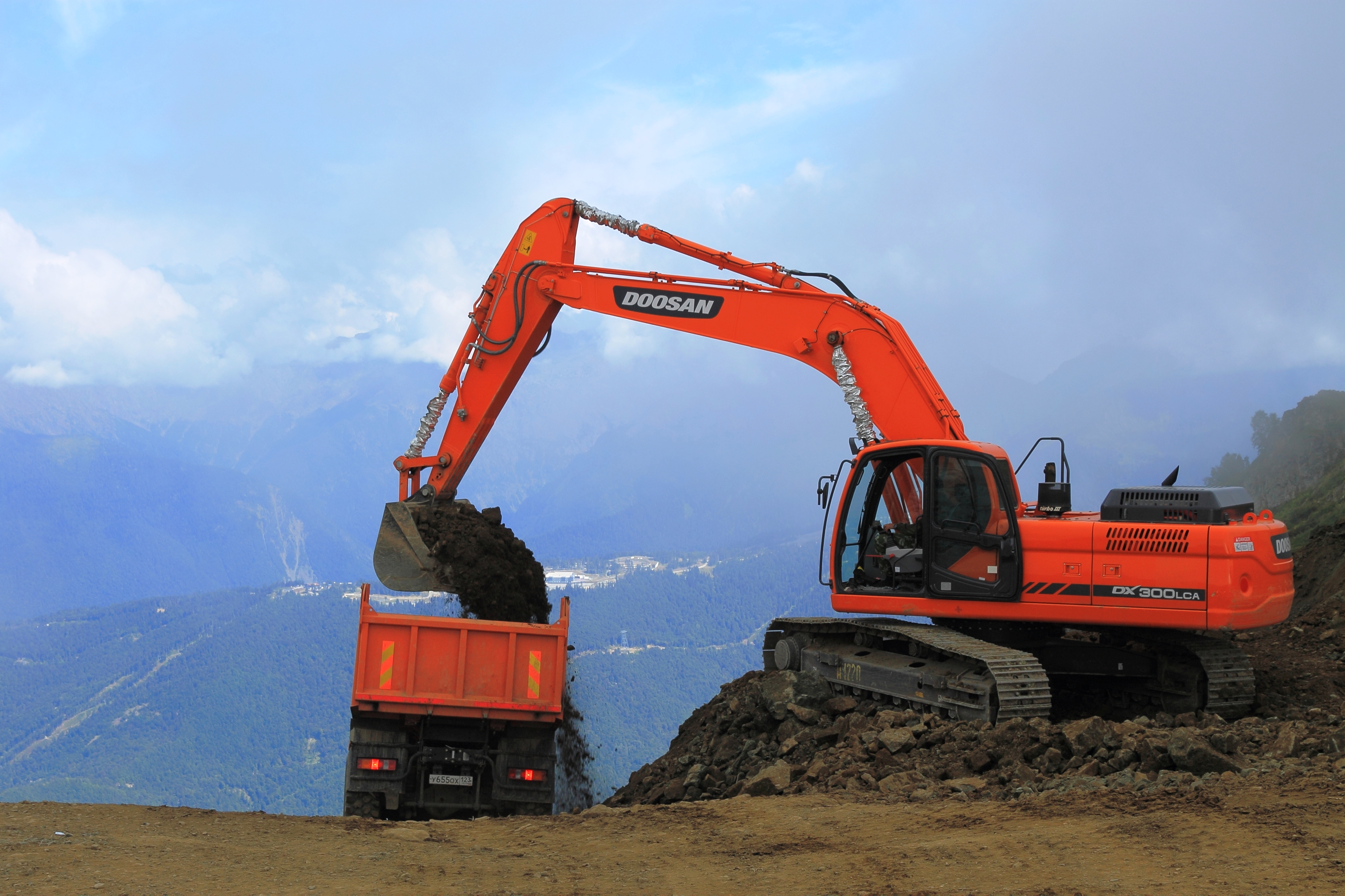 Excavator on the Aibga ridge