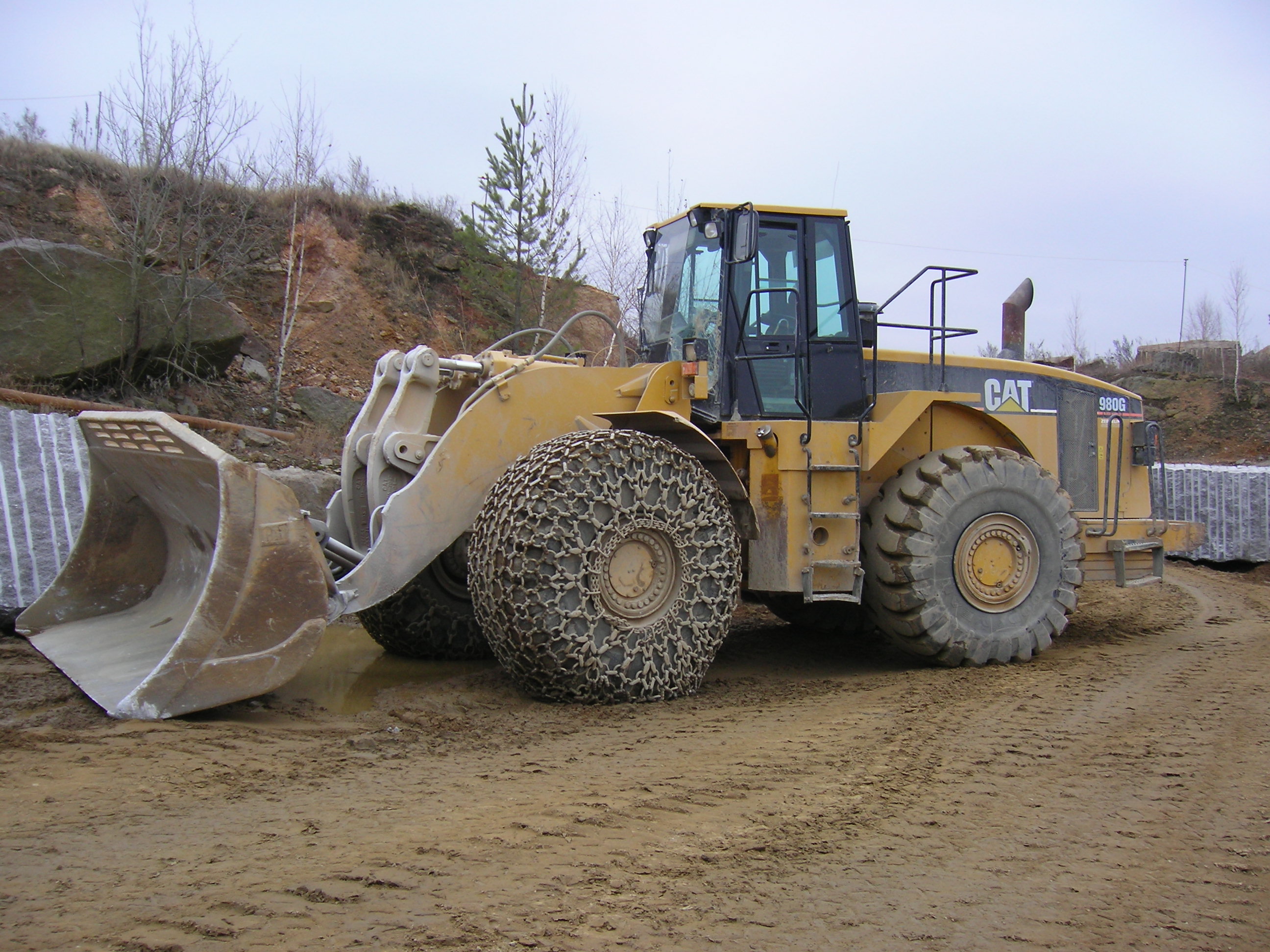 Loader in a granite quarry near the village of Kamiana Hora
