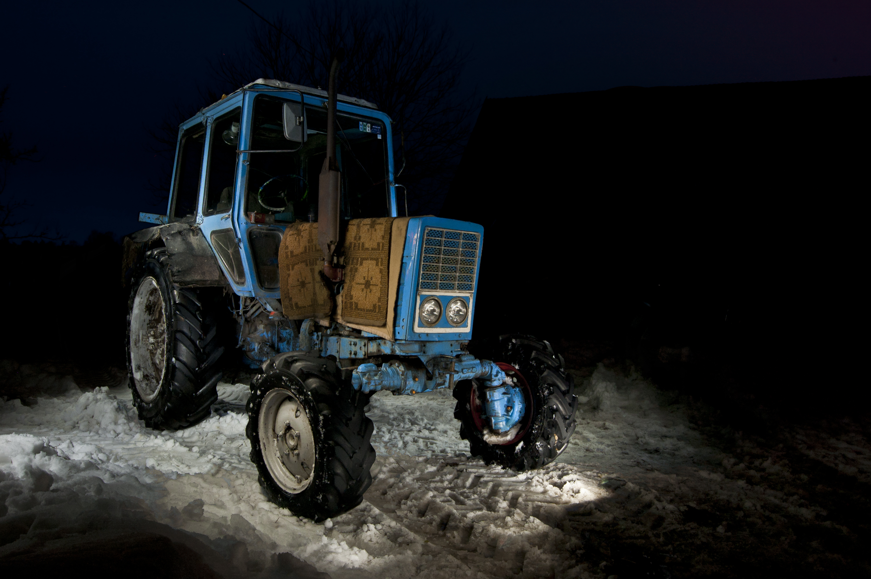 MTZ 82 light painting in winter night. Esotnia