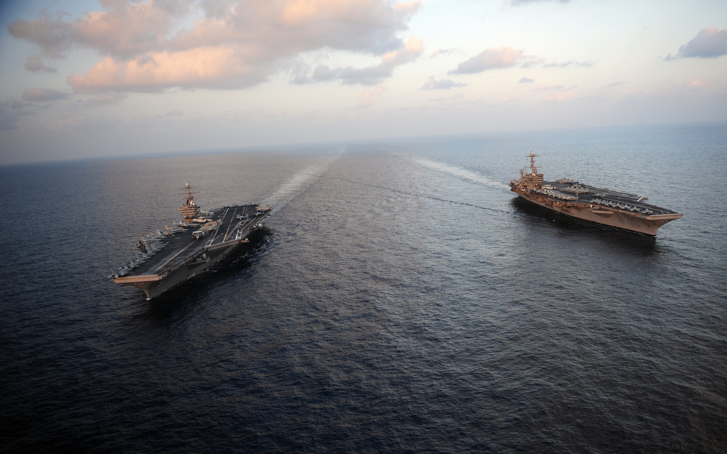 120119-N-YL945-045 - USS Abraham Lincoln (CVN 72) and USS John C. Stennis (CVN 74) join for a turnover of responsibility in the Arabian Sea