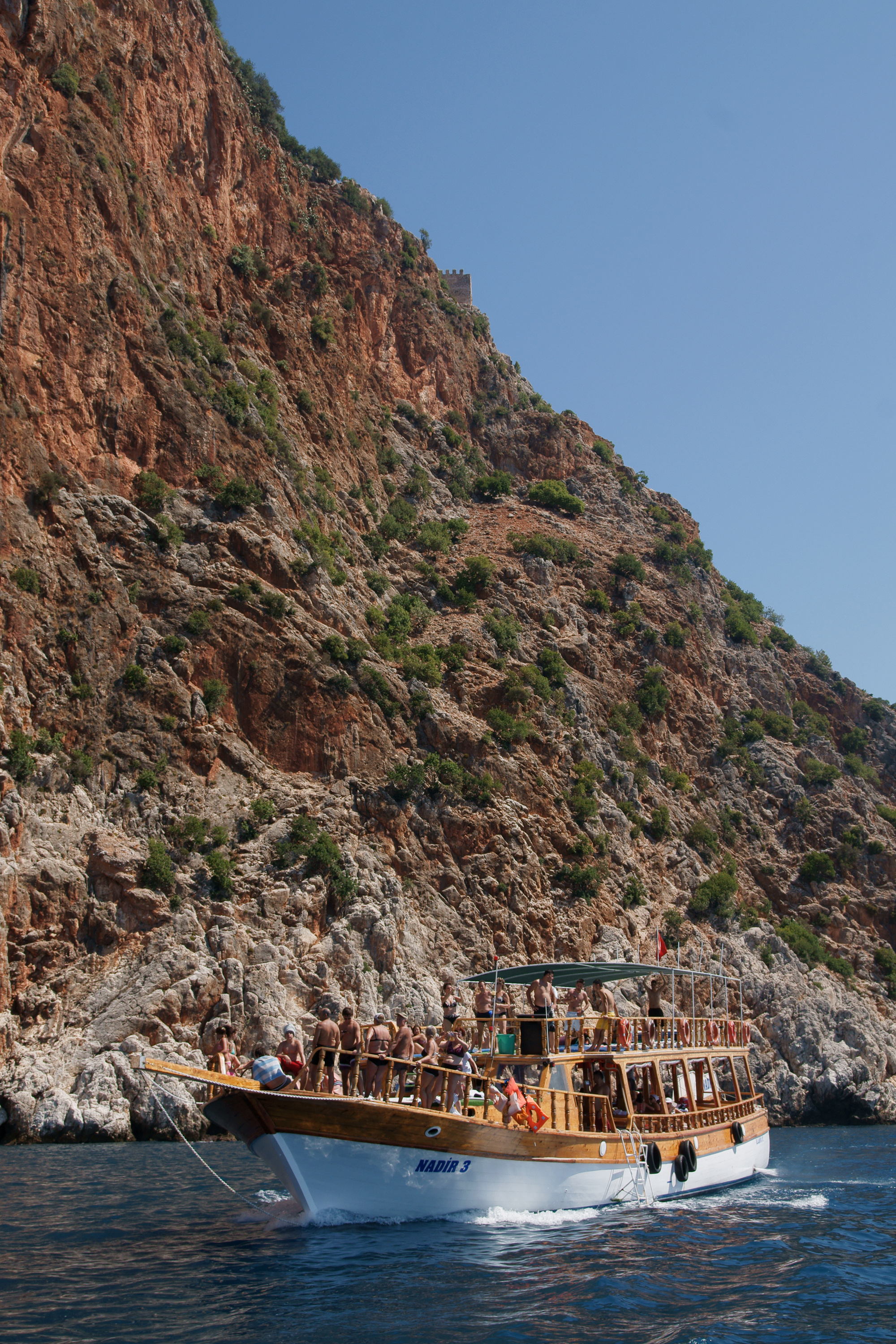 Boat cruising in Alanya Peninsula