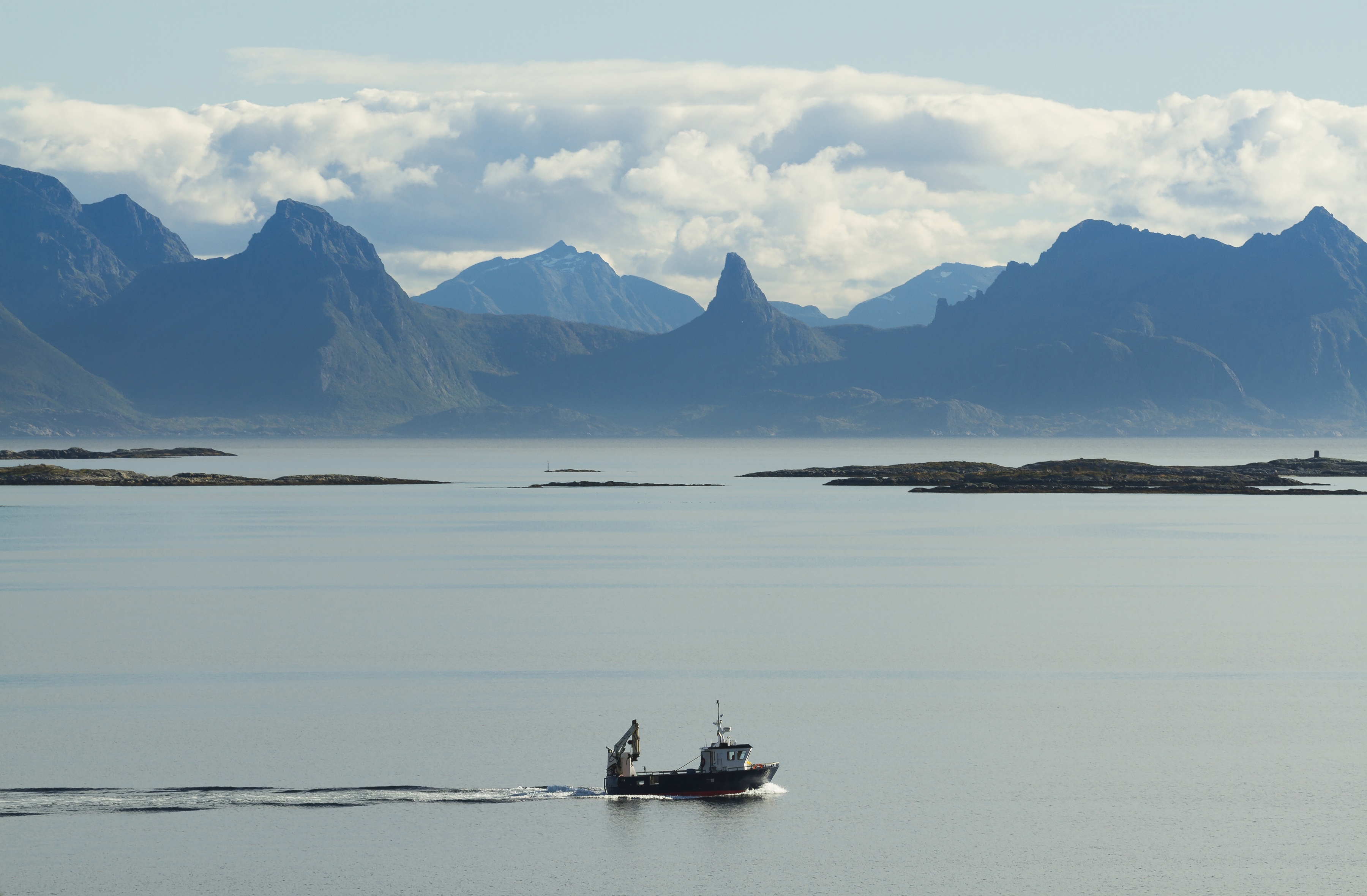 Boat in Vestfjorden with Hamarøya in the background, Nordland, Norway, 2015 September
