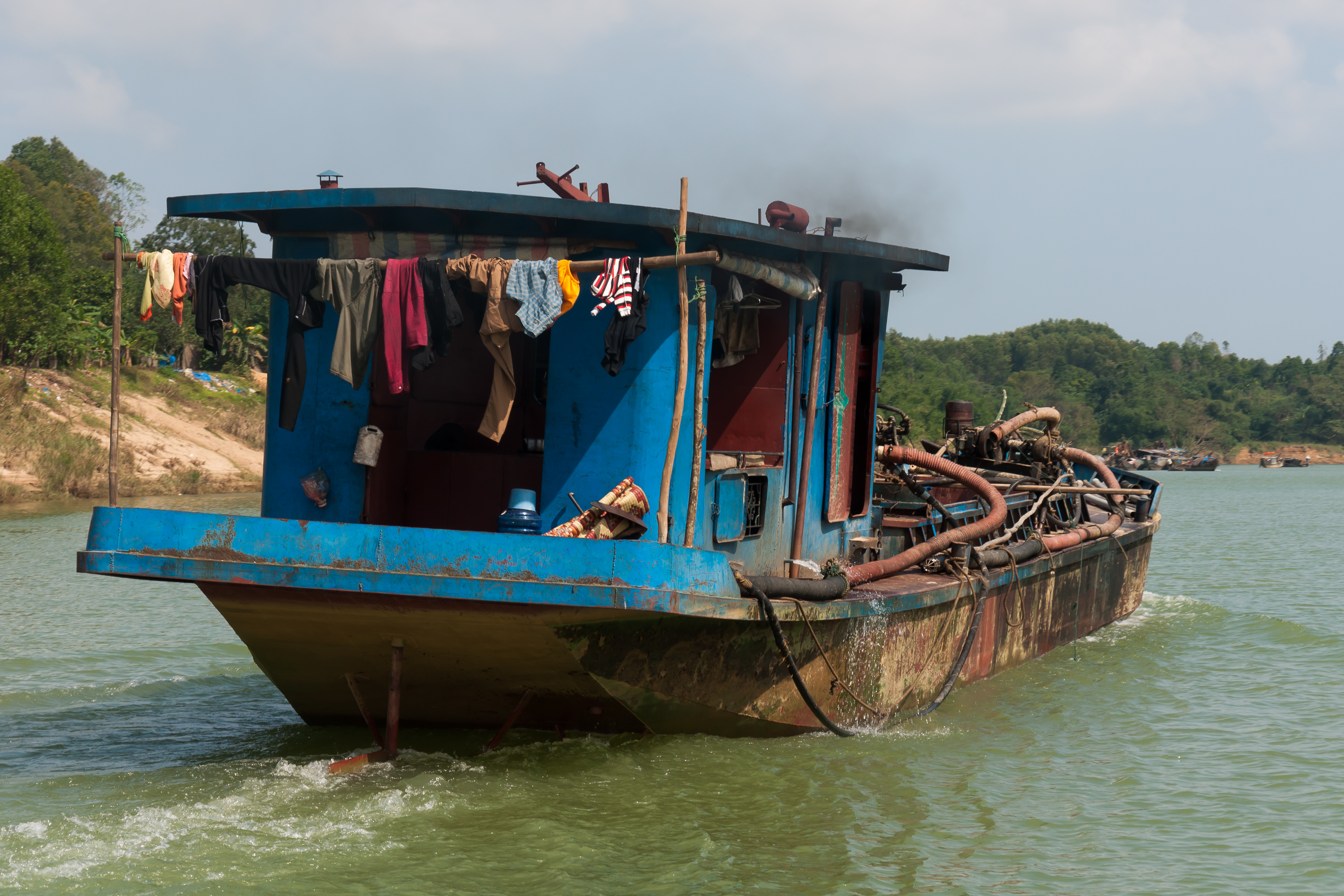 Hue Vietnam Freight-ship-on-the-Perfume-River-01