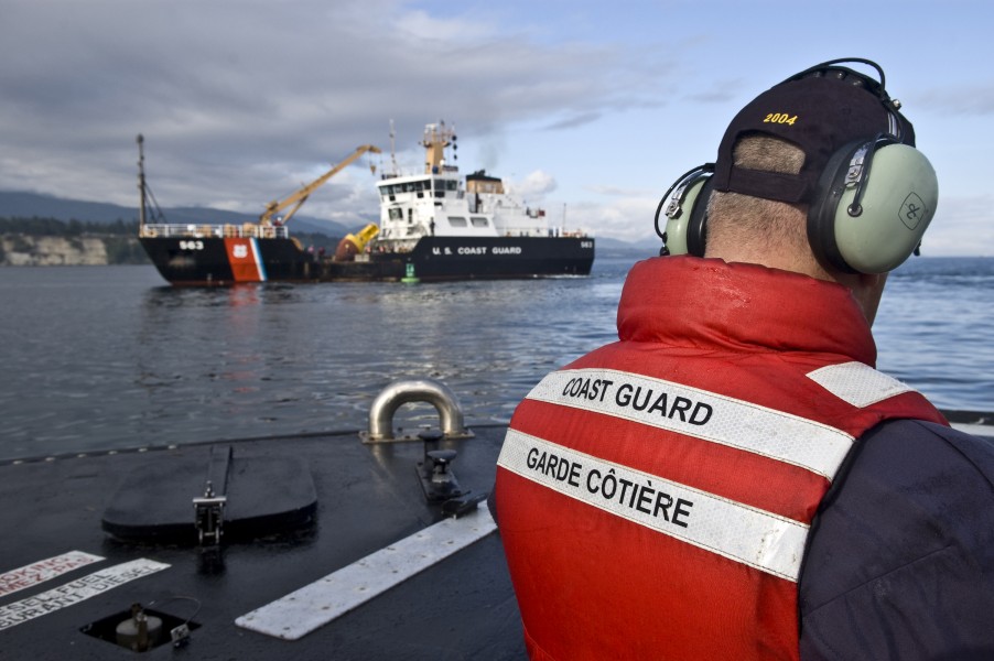 Cutters CCGC Provo Wallis and USCGC Henry Blake tend buoys -b