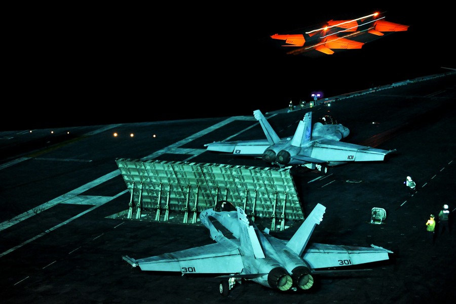 Defense.gov News Photo 101101-N-2821G-162 - An F A-18E Super Hornet launches from the aircraft carrier USS Abraham Lincoln CVN 72 during night flight operations in the Gulf of Oman on Nov. 1