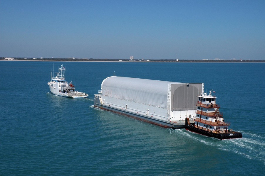 Pegasus barge being moved by Freedom Star and towboat American 2