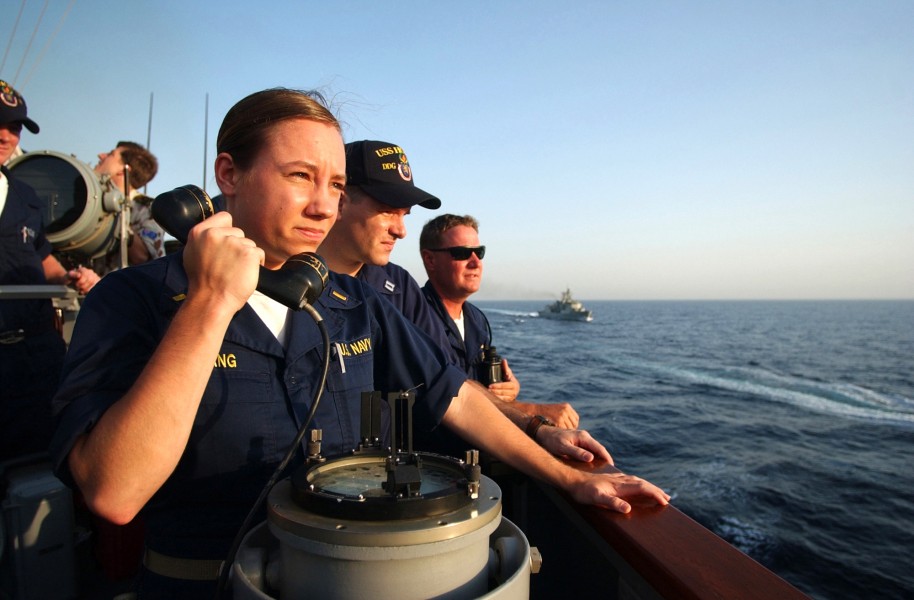 US Navy 020805-N-3580W-009 Ensign Schang relays information to the Bridge during a refueling at sea (RAS)