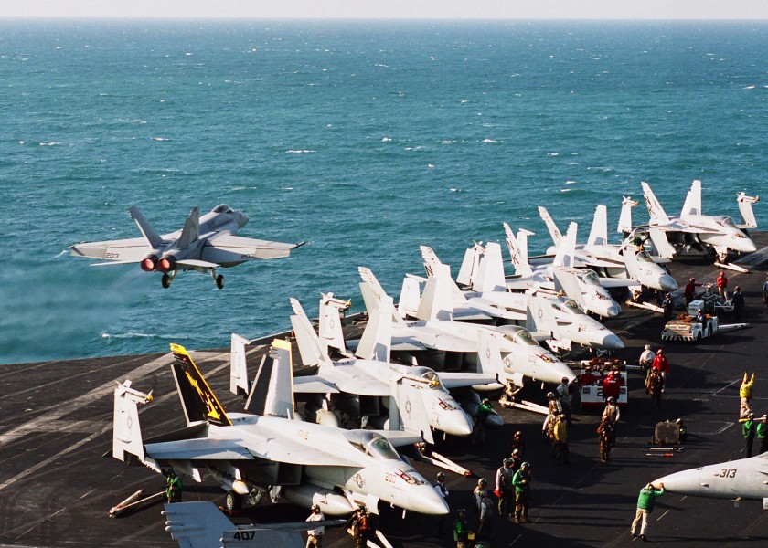 US Navy 021114-N-6817C-001 An F-A-18 Super Hornet assigned to the Eagles of Strike Fighter Squadron One One Five (VFA-115) uses his afterburner during routine launch off of the flight deck