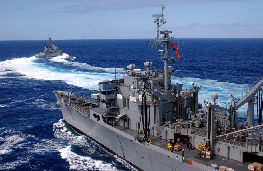 US Navy 030210-N-0233J-114 The guided missile destroyer USS Lassen (DDG 82) speeds away from the fast combat support ship USS Sacramento (AOE 1)